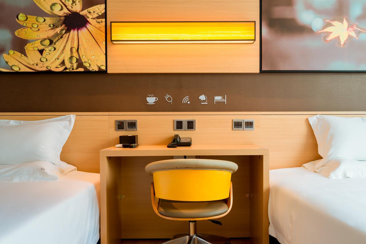 Iu Hotel Ruoyang Yiyang Wenhua Road Экстерьер фото
